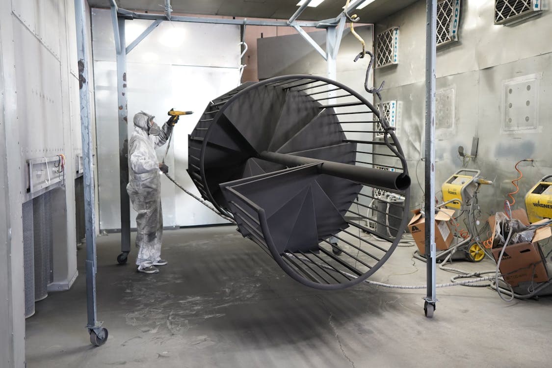 Automated industrial spray line